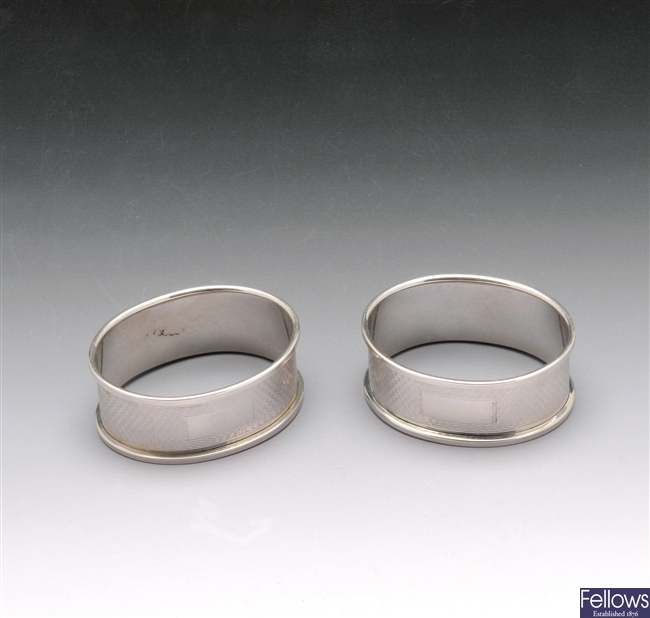 A pair of modern silver napkin rings
