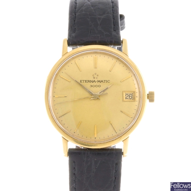 An 18k gold Eterna-Matic wrist watch.