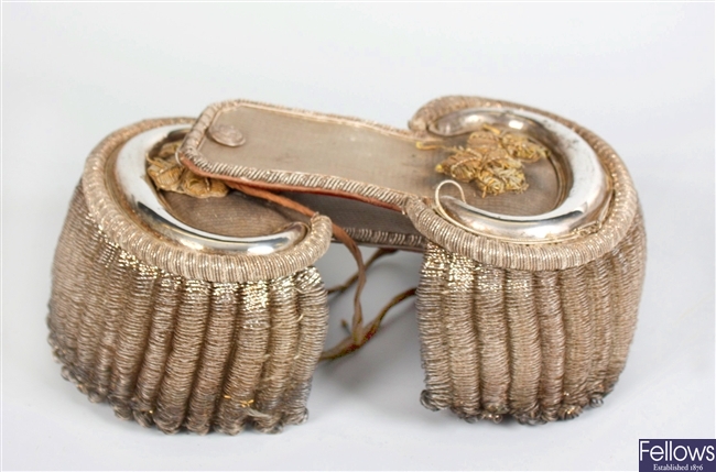 A pair of 19th century white metal and silver epaulettes
