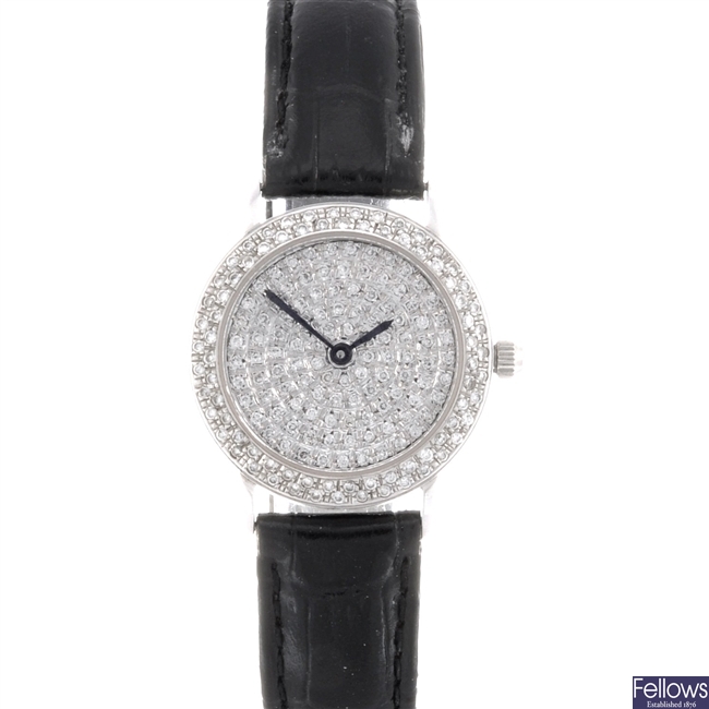 (33224) Ladys diamond set wristwatch in 14 carat