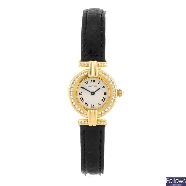 An 18k gold quartz lady's Cartier wrist watch.