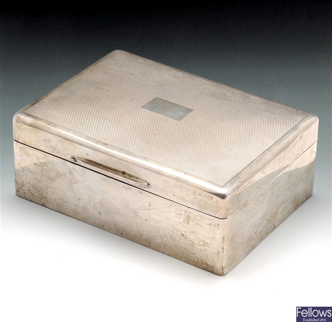 A modern silver mounted cigarette box.