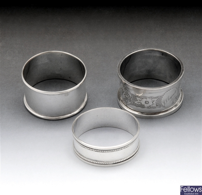 Victorian silver napkin ring & two later examples.
