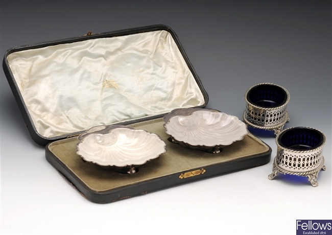 Pair of silver plated cased butter dishes and a pair of plated open salts.