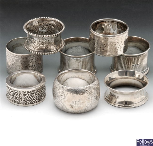 Pair of Victorian silver napkin rings, five other Victorian examples & a white metal napkin ring.