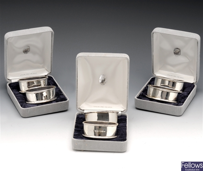 Set of six modern silver napkin rings.
