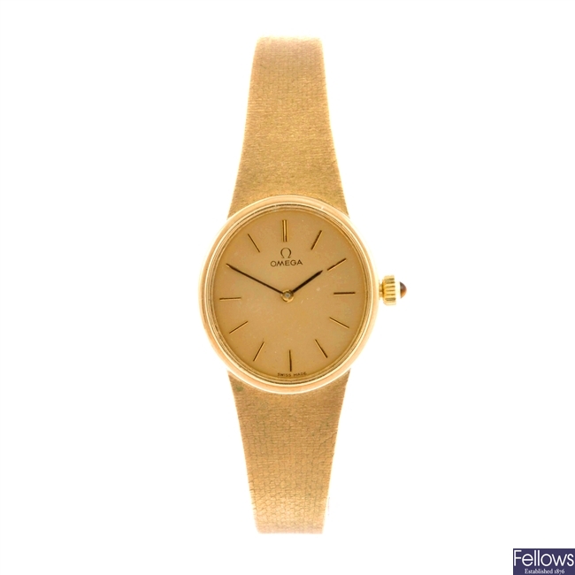 A 9k gold manual wind lady's Omega bracelet watch.