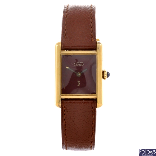 A Cartier wrist watch.