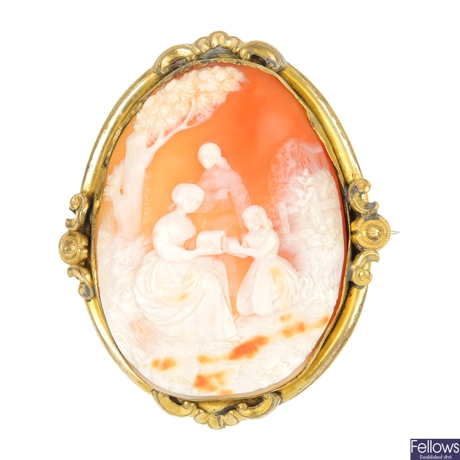 Two cameo brooches, and an agate brooch.