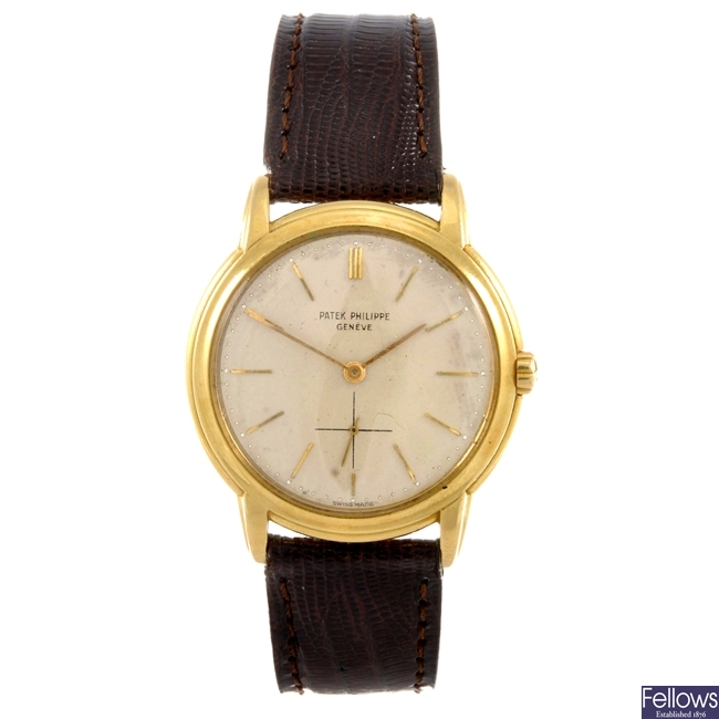 An 18k gold automatic gentleman's Patek Phillippe wrist watch