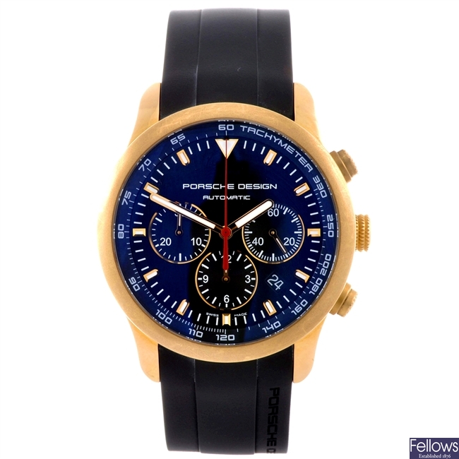 An 18k gold Porsche Design wrist watch.