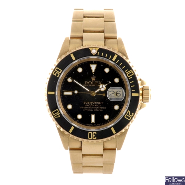 An 18k gold automatic gentleman's Rolex Submariner bracelet watch.