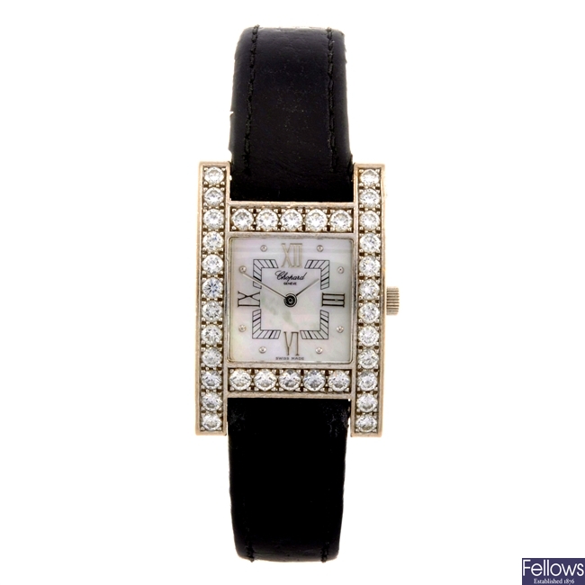 An 18k white gold quartz lady's Chopard wrist watch.