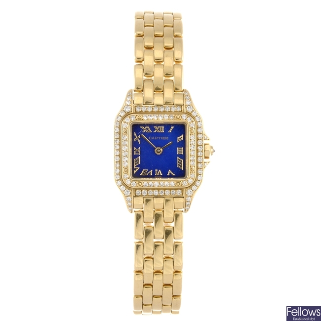 An 18k gold quartz lady's Cartier Panthere bracelet watch.