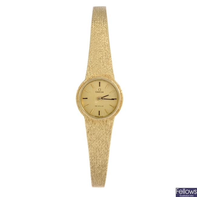 An 18k gold manual wind lady's Omega De Ville bracelet watch.