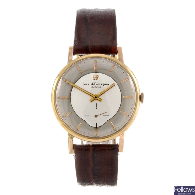 A gold plated manual wind gentleman's Girard Perregaux wrist watch.