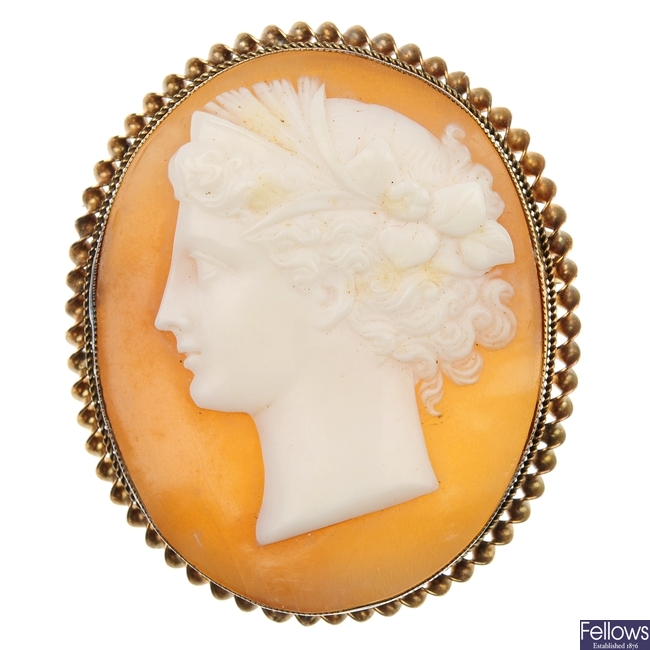 Four cameo brooches.