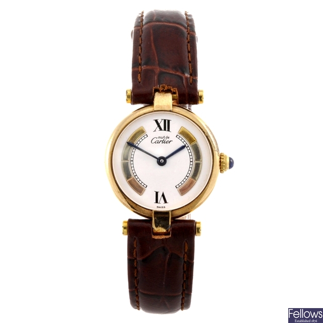 A gold plated quartz lady's Must De Cartier wrist watch.