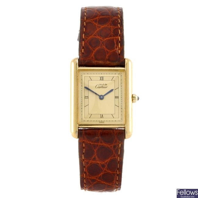 A gold plated quartz gentleman's Cartier Must De Cartier wrist watch.