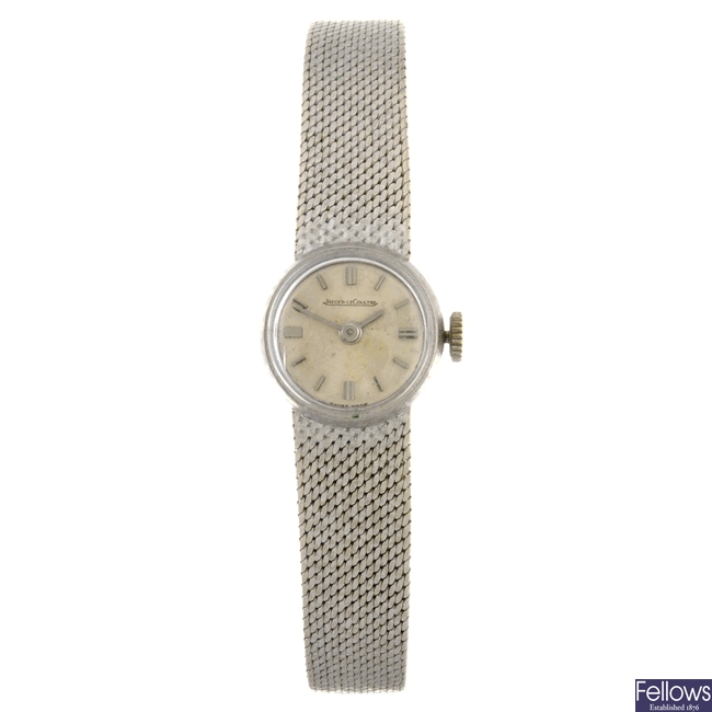 An 18k white gold manual wind lady's Jaeger-LeCoultre bracelet watch.
