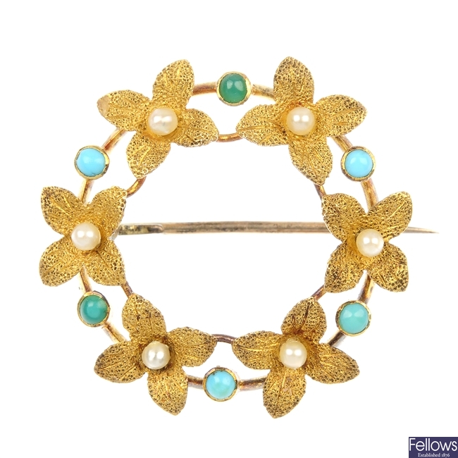 An early 20th century turquoise and seed pearl brooch. 