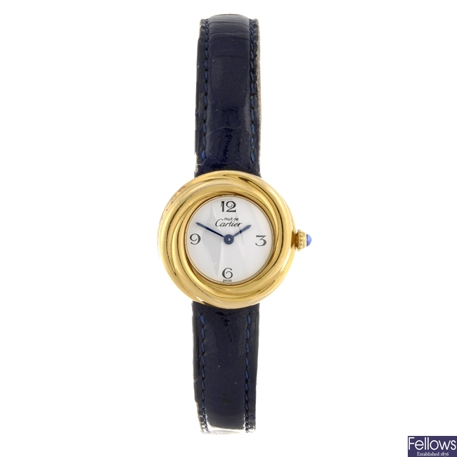 A gold plated quartz lady's Must de Cartier wrist watch.