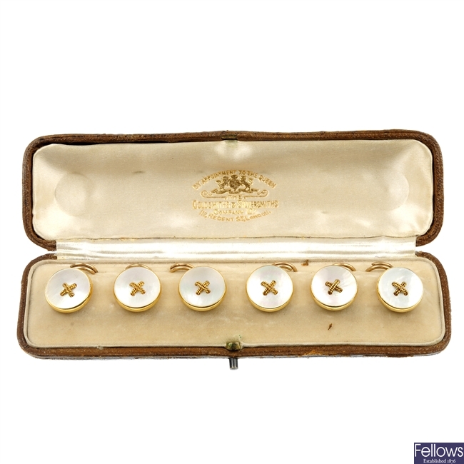 A set of early 20th century 18ct gold mother-of-pearl buttons.