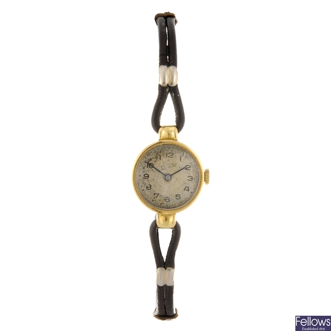 An 18k gold manual wind lady's Longines wrist watch together with a gold plated Rotary wrist watch.