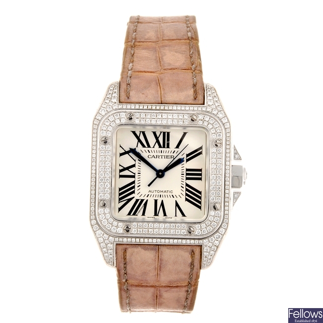 An 18k white gold automatic lady's Cartier Santos wrist watch.