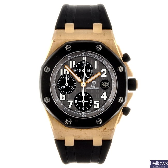 An 18k gold automatic chronograph gentleman's Audemars Piguet Royal Oak Offshore wrist watch.