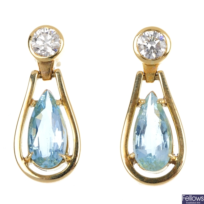 A pair of aquamarine and diamond ear pendants.