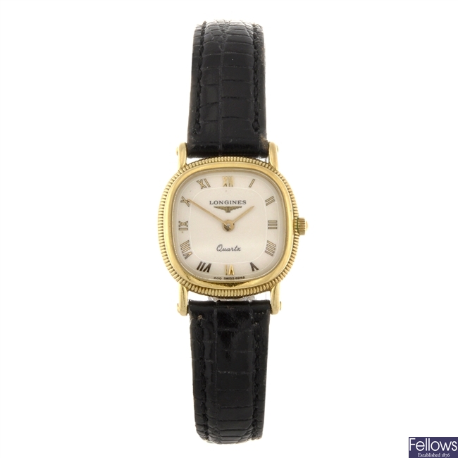 An 18k gold quartz lady's Longines wrist watch.