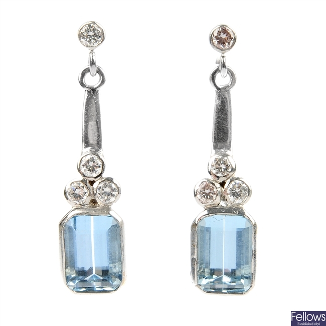 A pair of 18ct gold aquamarine and diamond earrings.