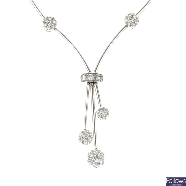 A diamond floral necklace.