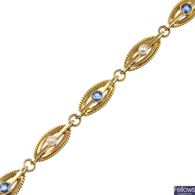 An early 20th century 15ct gold sapphire and seed pearl bracelet.