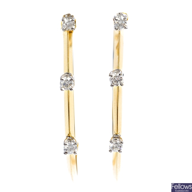 A pair of 18ct gold diamond ear hoops. 