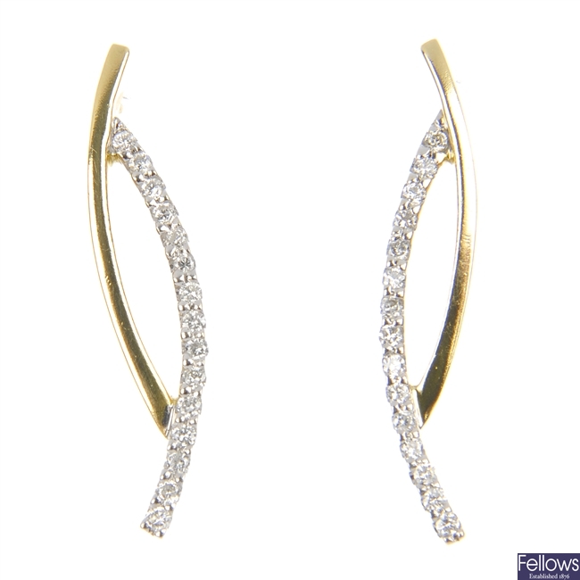 A pair of 18ct gold diamond ear pendants. 