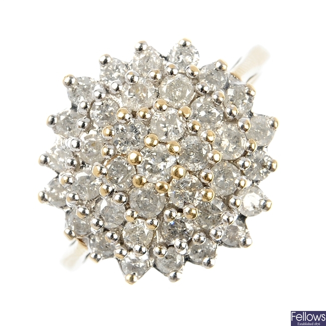 A 9ct gold diamond cluster ring. 