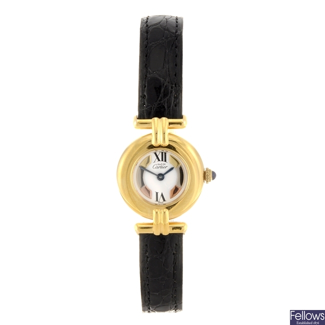 A gold plated silver quartz lady's Must de Cartier Vermeil wrist watch.