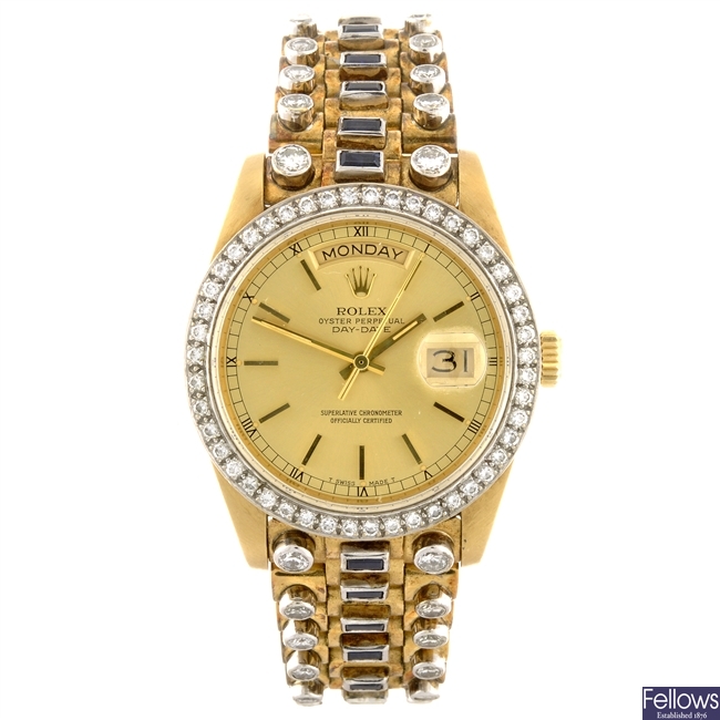 An 18k gold customised automatic gentleman's Rolex Day-Date bracelet watch.