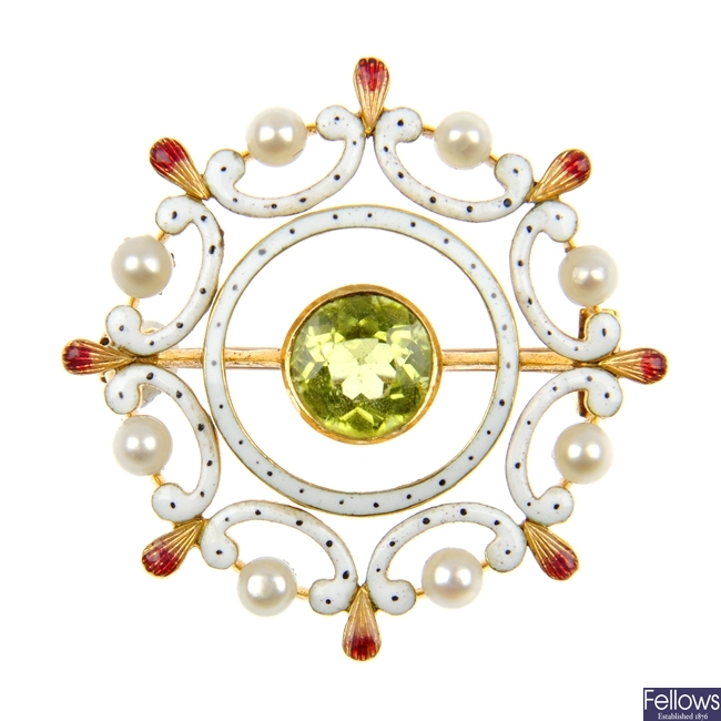 An early 20th century peridot, seed pearl and enamel brooch.