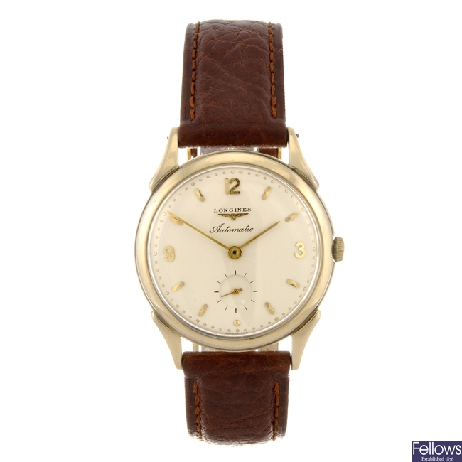 A gold plated manual wind gentleman's Longines wrist watch.