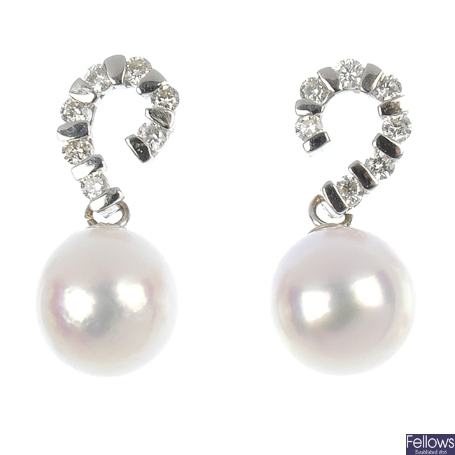 A pair of 18ct gold cultured pearl and diamond ear pendants. 