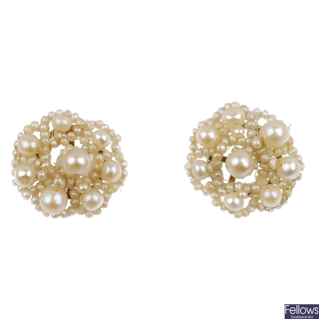 A pair of seed pearl cluster earrings.