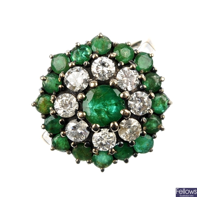 A 1970s 18ct gold emerald and diamond cluster ring