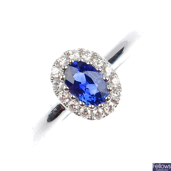 A sapphire and diamond cluster ring. 