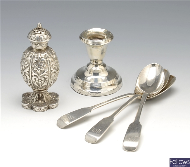 Victorian silver pepper pot, three Victorian teaspoons & a dwarf candlestick.