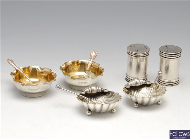 A selection of three late Victorian cased silver condiments.