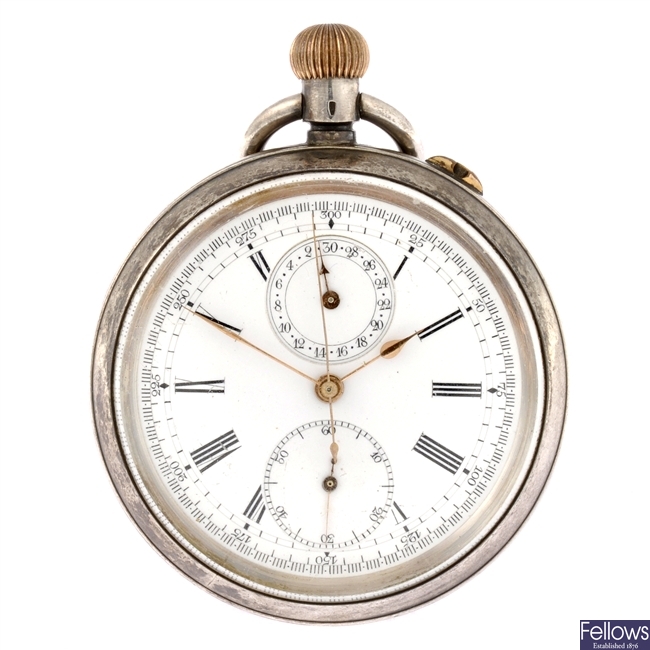 A silver keyless wind open face pocket chronograph.