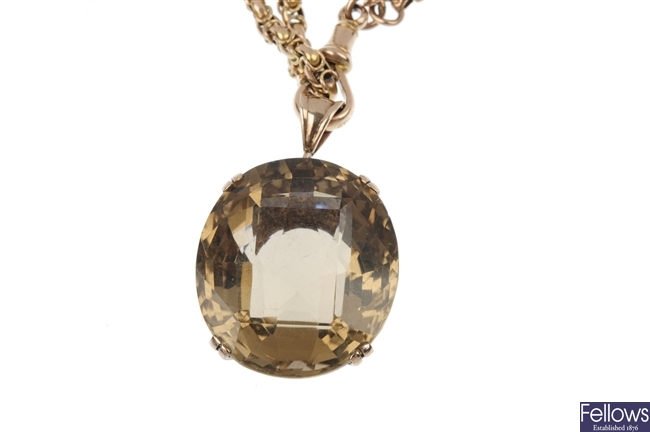 A smokey quartz single-stone pendant and an early 20th century 9ct gold longuard chain.